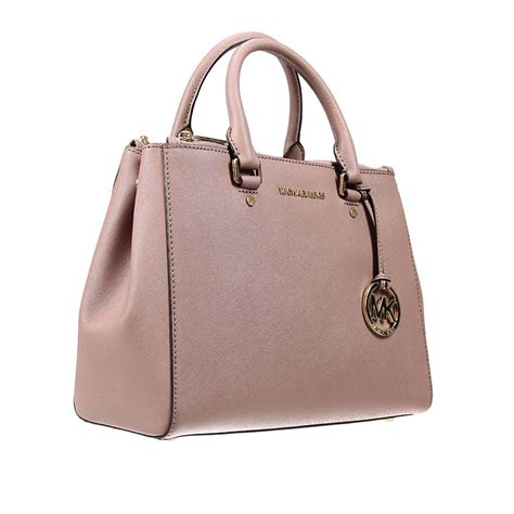 pink handbag michael kors|More.